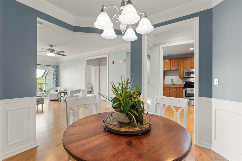 418 John Mahar Highway, Unit 408 Braintree, MA 02184 - Photo 9 of 35 a view of a dining room with furniture