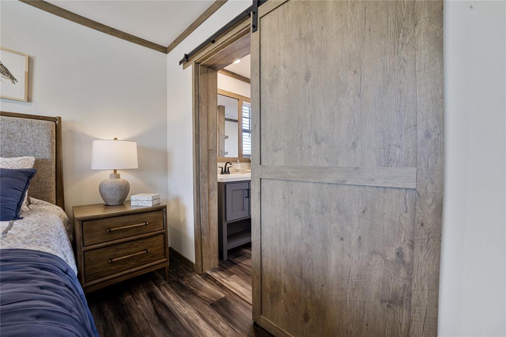 2004 Buffet Way Poolville, TX 76487 - Photo 20 of 36 a bedroom with a bed and a dresser