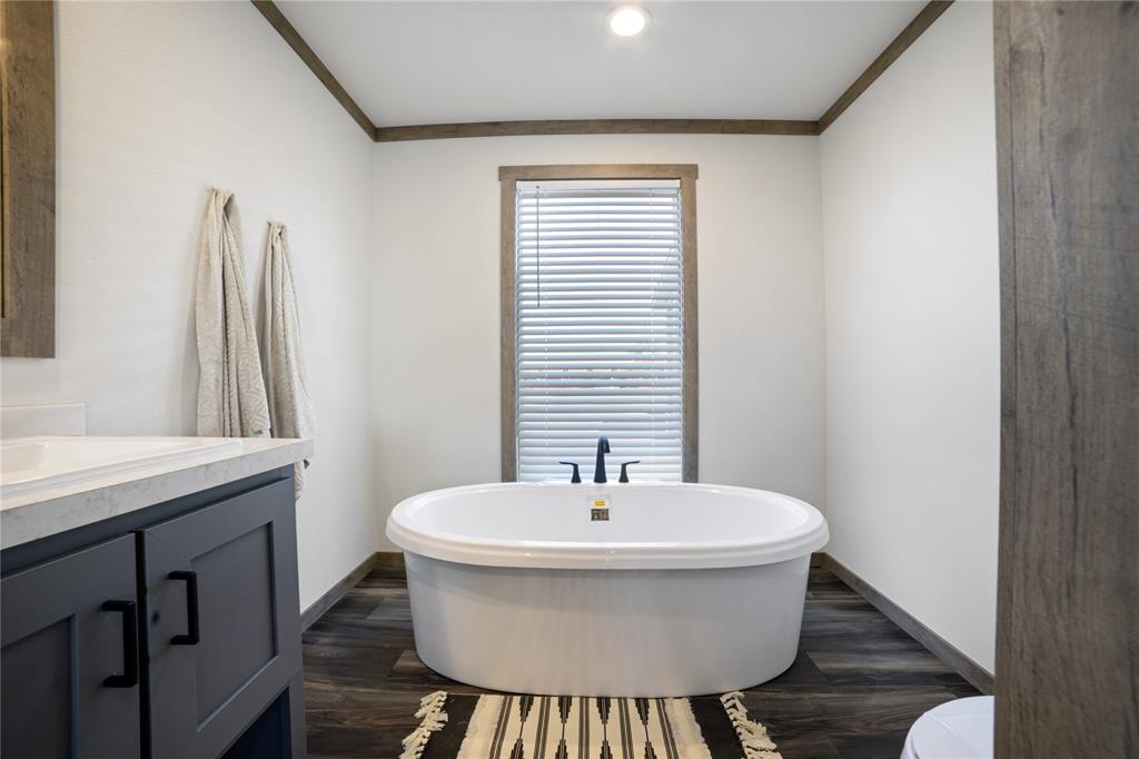 2004 Buffet Way Poolville, TX 76487 - Photo 25 of 36 a bathroom with a sink and a mirror