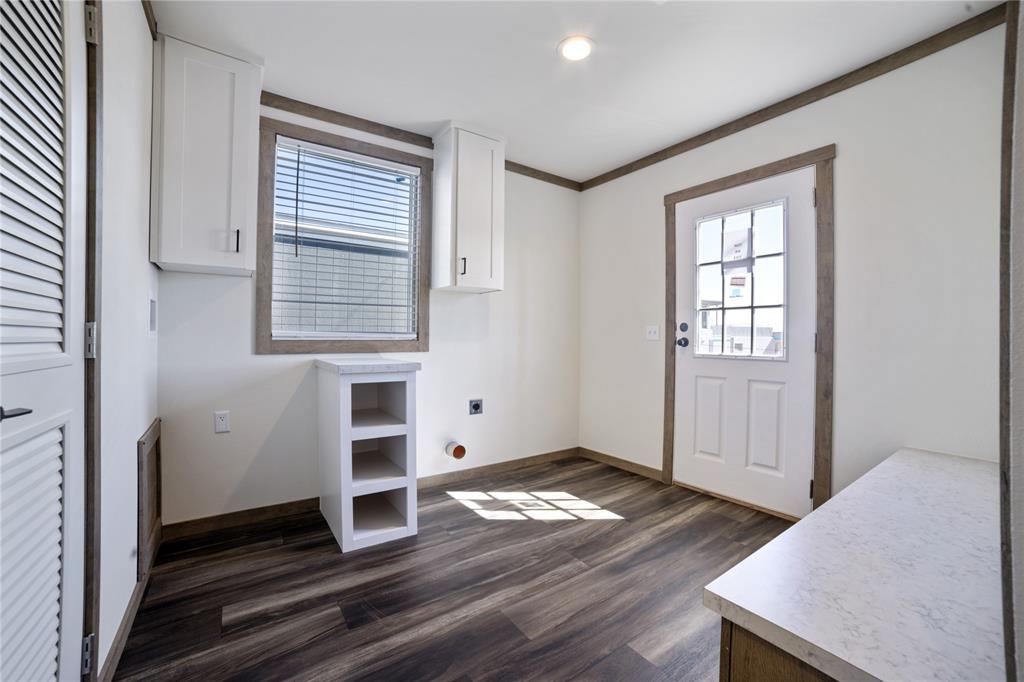 2004 Buffet Way Poolville, TX 76487 - Photo 27 of 36 an empty room with wooden floor closet and windows