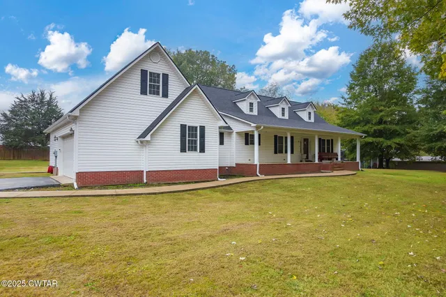 a view of a house with a swimming pool