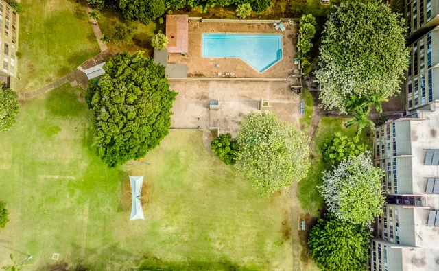 a view of a swimming pool with a patio