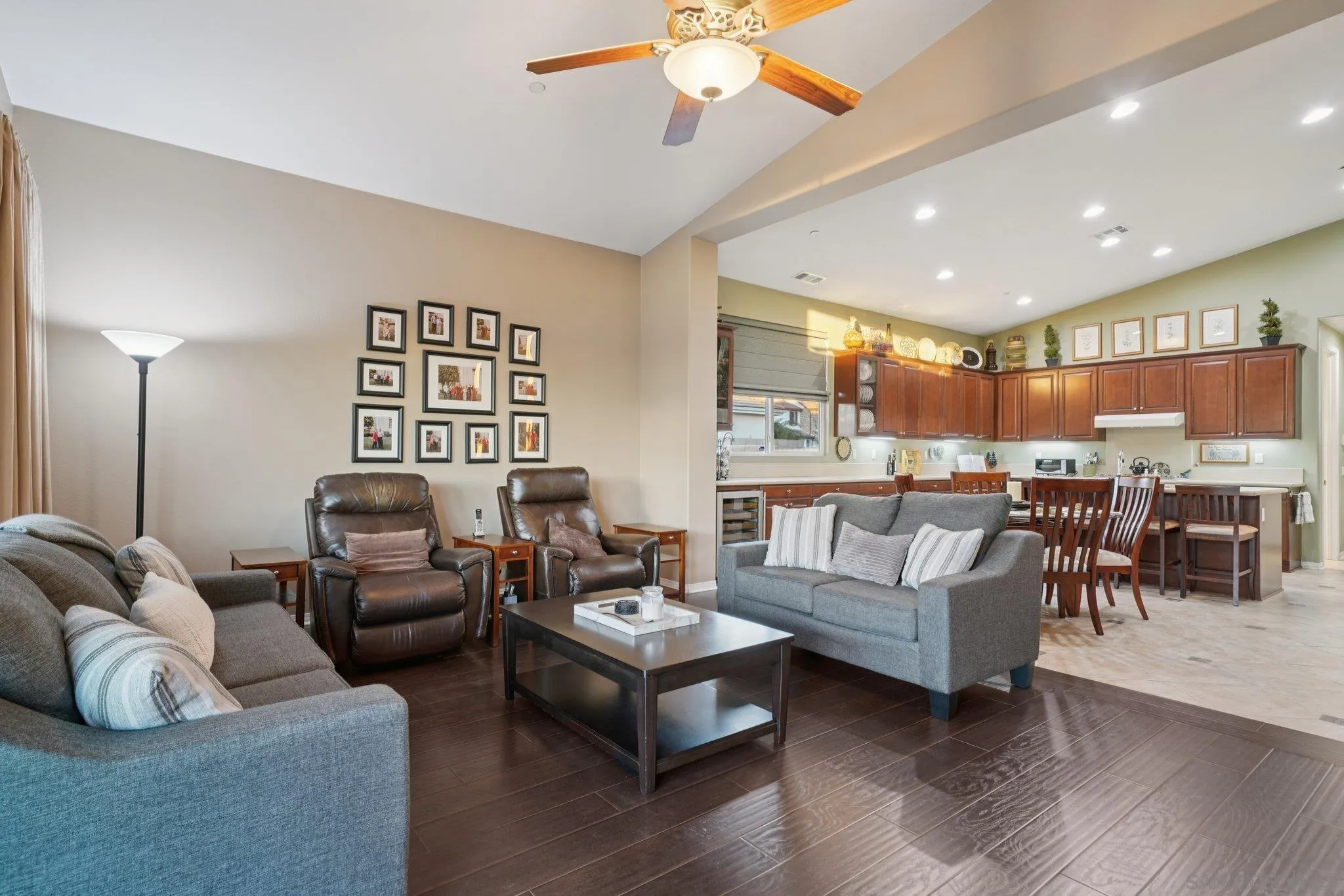 9471 Estrella Hills Street Riverside, CA 92508 - Photo 7 of 43 a living room with furniture kitchen view and a chandelier