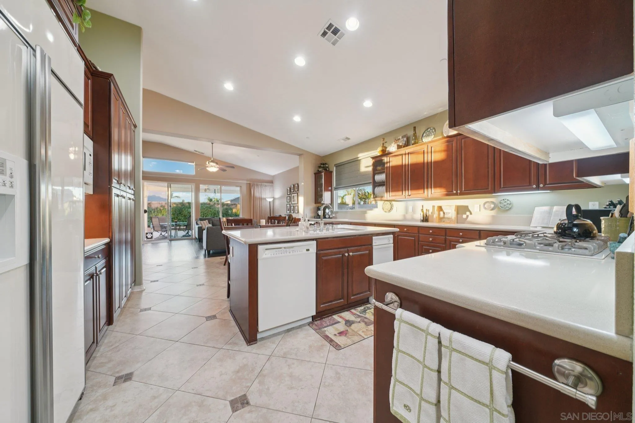 9471 Estrella Hills Street Riverside, CA 92508 - Photo 8 of 43 a kitchen with a sink and cabinets