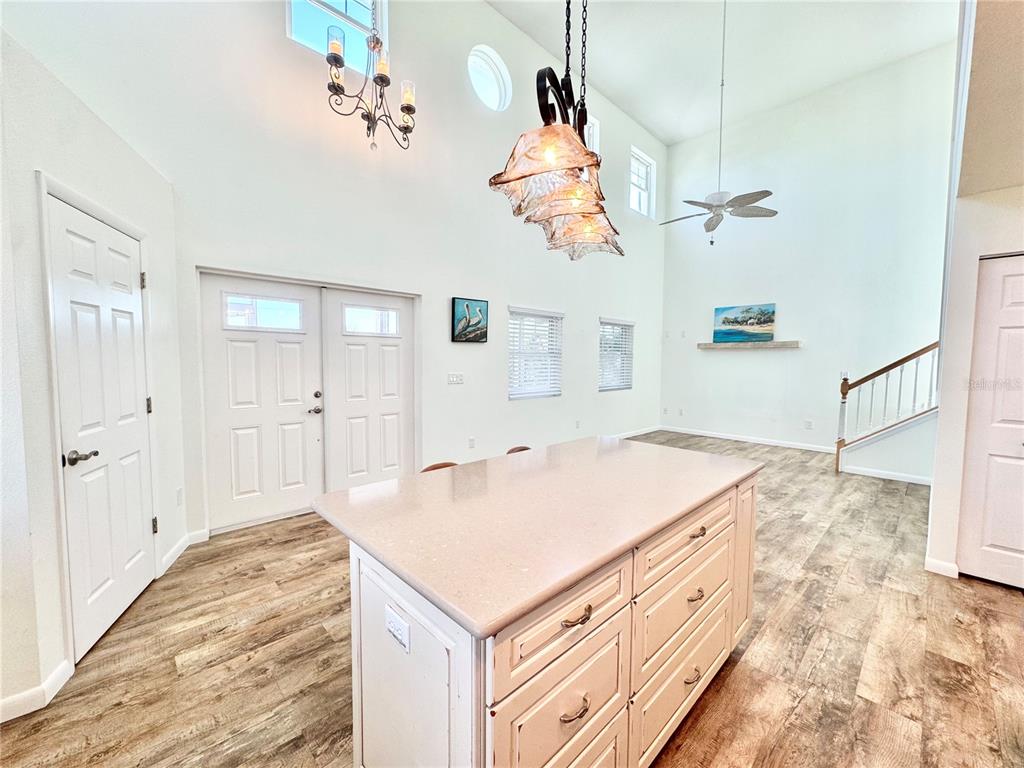 16204 3rd Street East Redington Beach, FL 33708 - Photo 16 of 58 a bathroom with a sink a mirror and a shower
