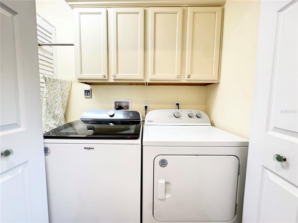 16204 3rd Street East Redington Beach, FL 33708 - Photo 21 of 58 a utility room with dryer and washer