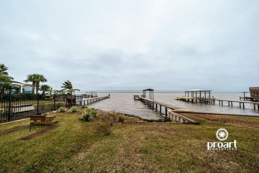 641 Bayshore Drive Destin, FL 32550 - Photo 11 of 34 a view of a terrace with sitting area