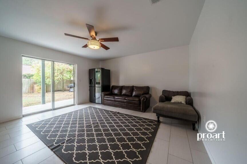 641 Bayshore Drive Destin, FL 32550 - Photo 13 of 34 a bedroom with furniture and a window