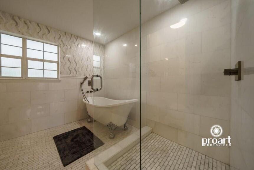 641 Bayshore Drive Destin, FL 32550 - Photo 20 of 34 a bathroom with a sink and a shower