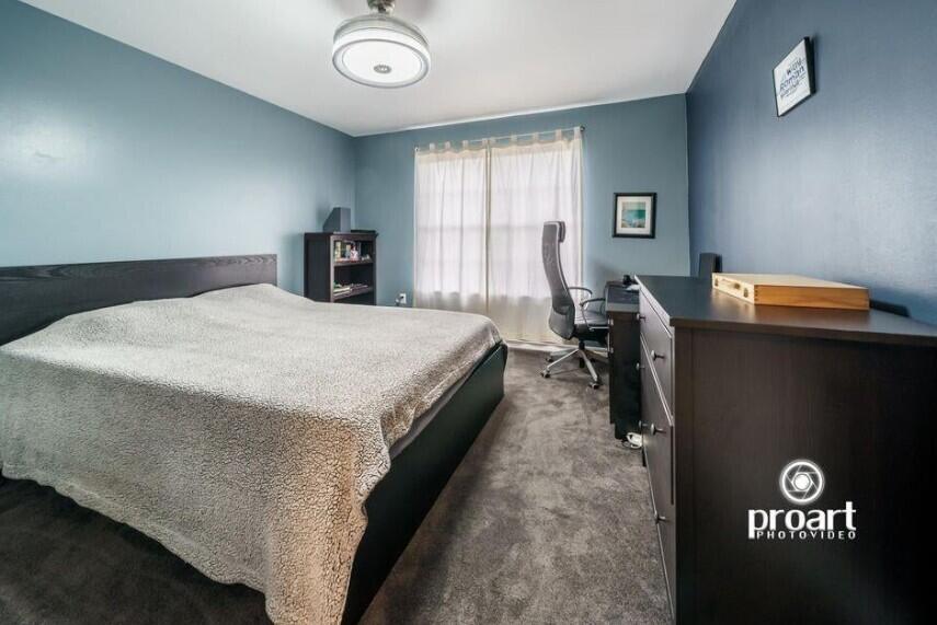 641 Bayshore Drive Destin, FL 32550 - Photo 21 of 34 a bed room with a bed and a tv