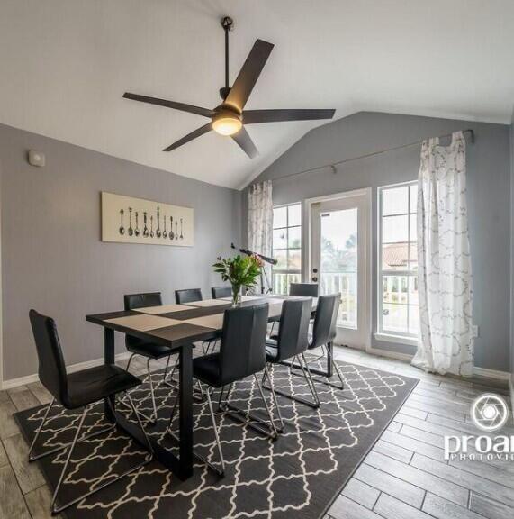 641 Bayshore Drive Destin, FL 32550 - Photo 29 of 34 a view of a dining room with furniture window and wooden floor
