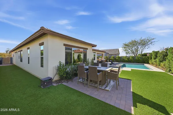 a front view of a house with a patio