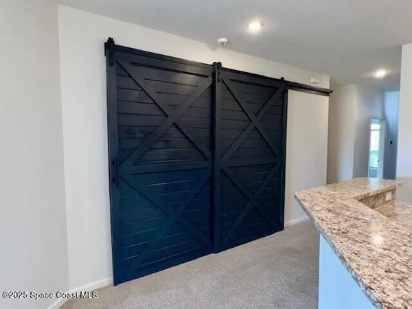 a view of storage and utility room