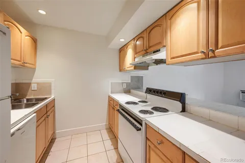 a kitchen with a stove and a microwave