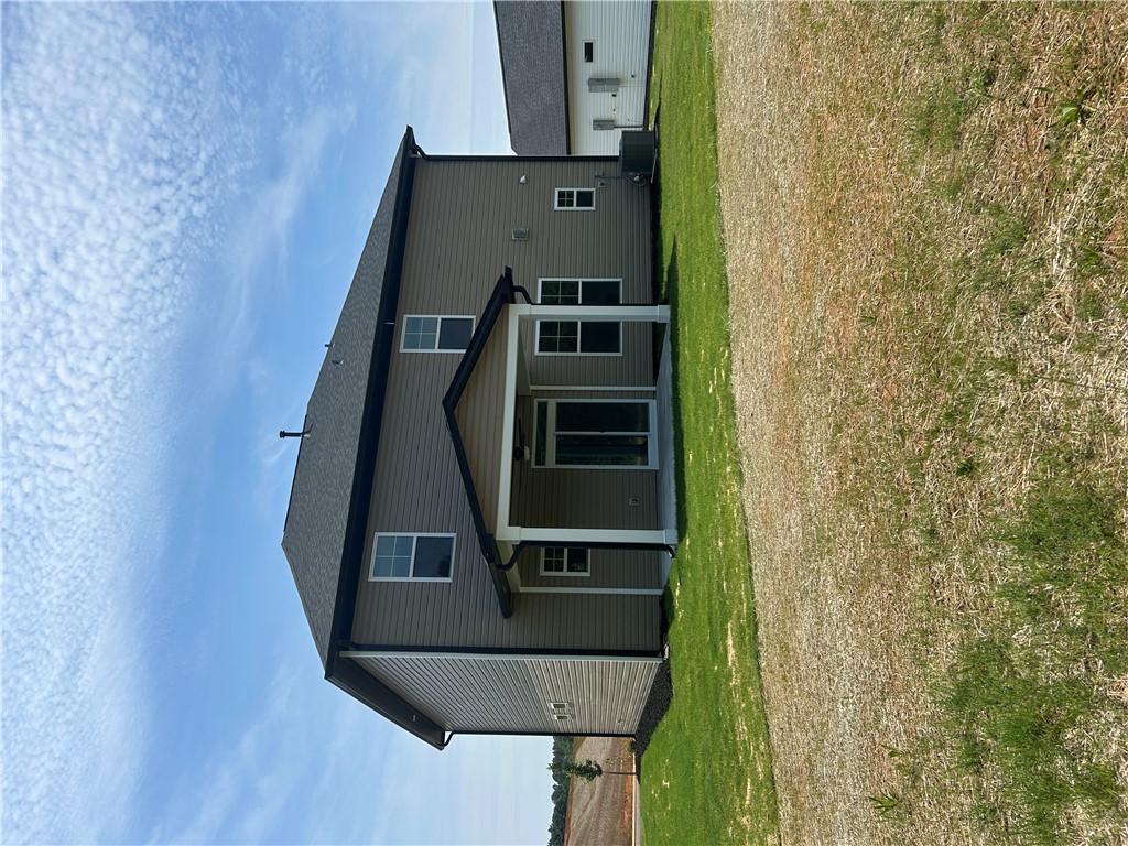 202 Bellflower Lane Pendleton, SC 29670 - Photo 26 of 27 A newly constructed residence features an inviting covered patio, perfect for outdoor leisure.