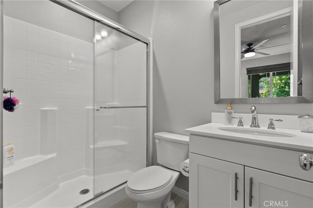 232 River Street Fillmore, CA 93015 - Photo 22 of 61 a bathroom with a granite countertop sink toilet and shower