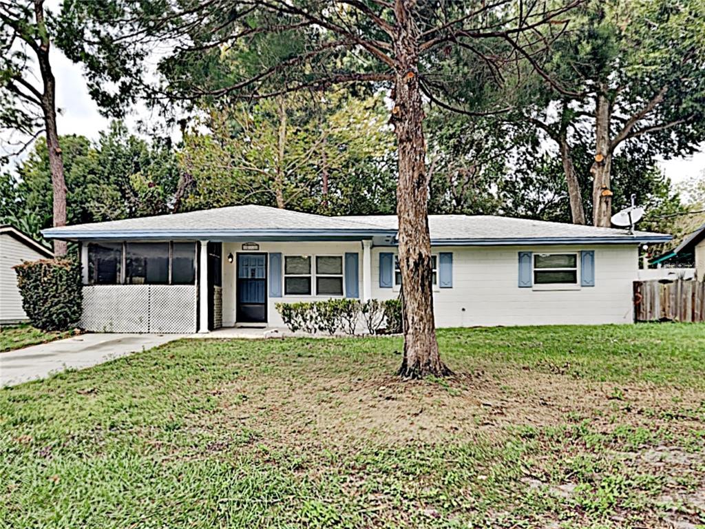 2733 Oak Drive Apopka, FL 32703 - Photo 1 of 15 a front view of a house with a yard