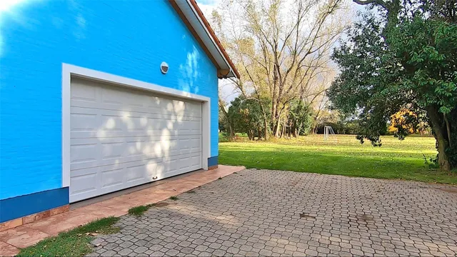 a view of swimming pool with a yard