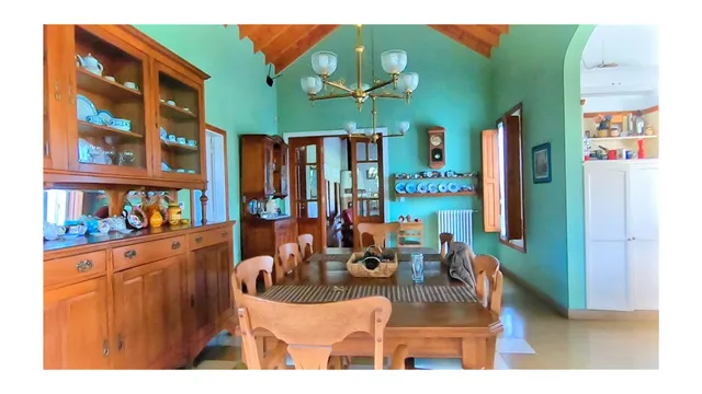 a view of a room that has a large window