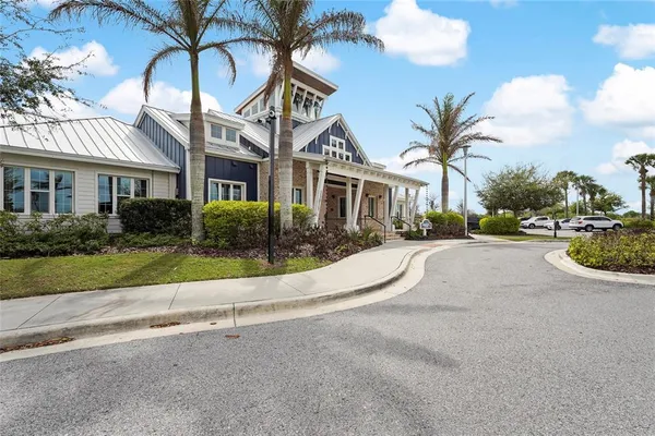 a view of outdoor space with playground and green space