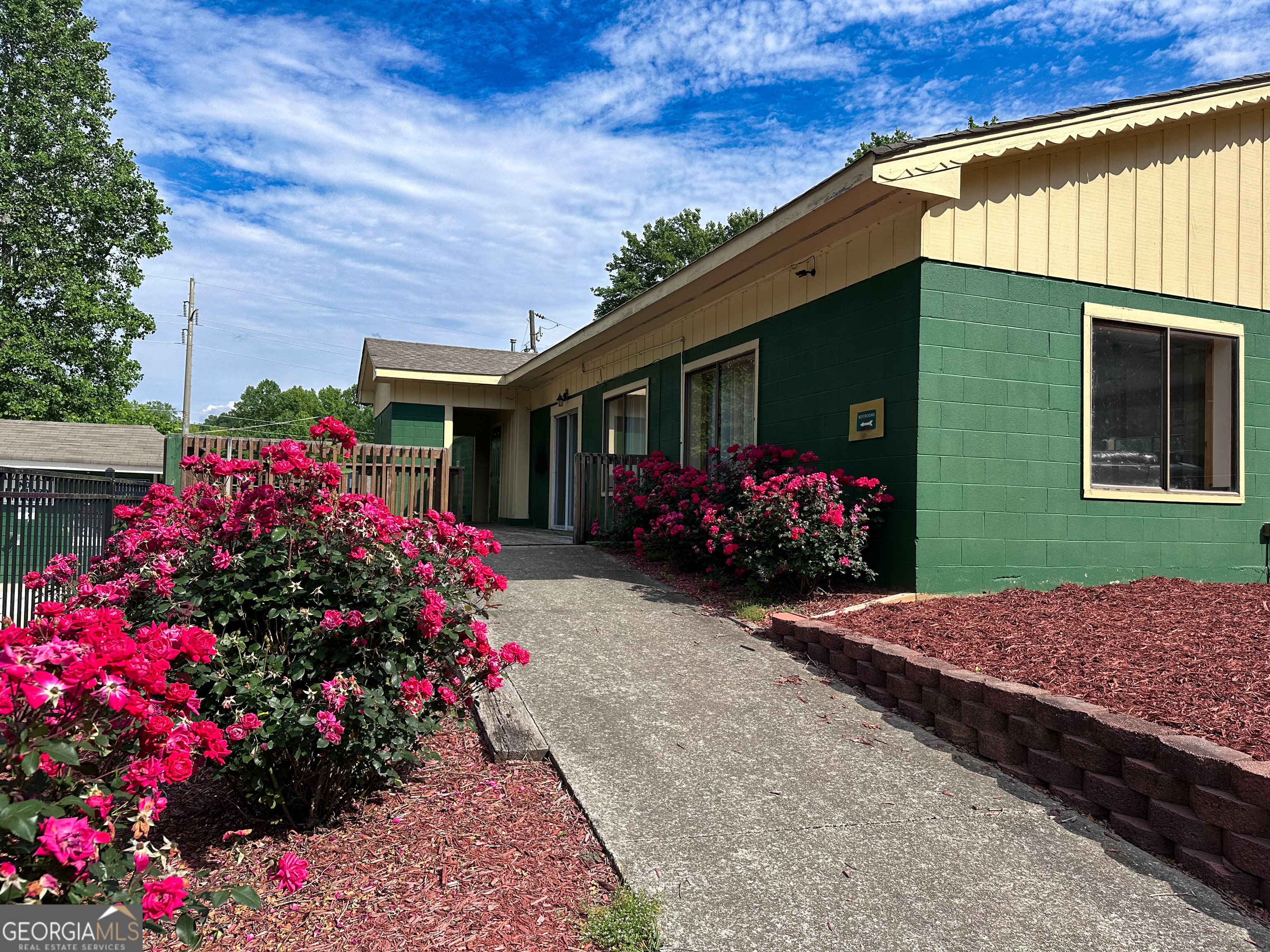 68 Nomad Trail Cleveland, GA 30528 - Photo 20 of 20 a view of a house that has a flower garden