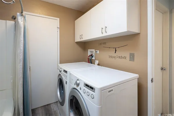 a utility room with dryer and washer
