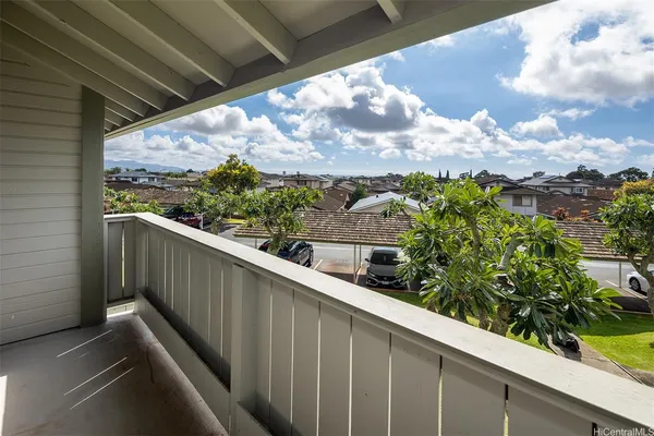 a view of a balcony with an outdoor space