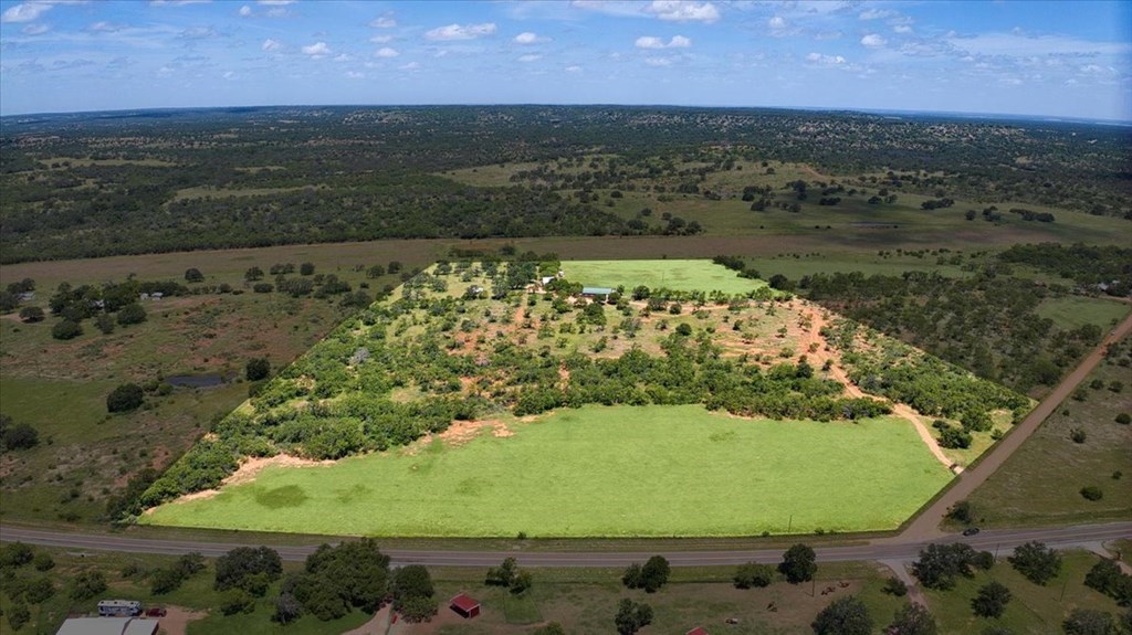 6446 Blackjack Road Fredonia, TX 76842 - Photo 8 of 48 a view of a lake with a yard