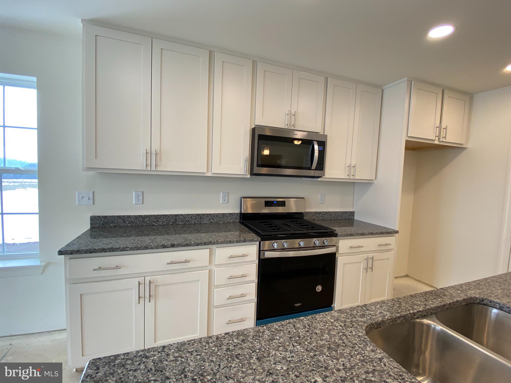 126 Eagle Road Dillsburg, PA 17019 - Photo 5 of 40 42" maple painted cabinets with granite counters