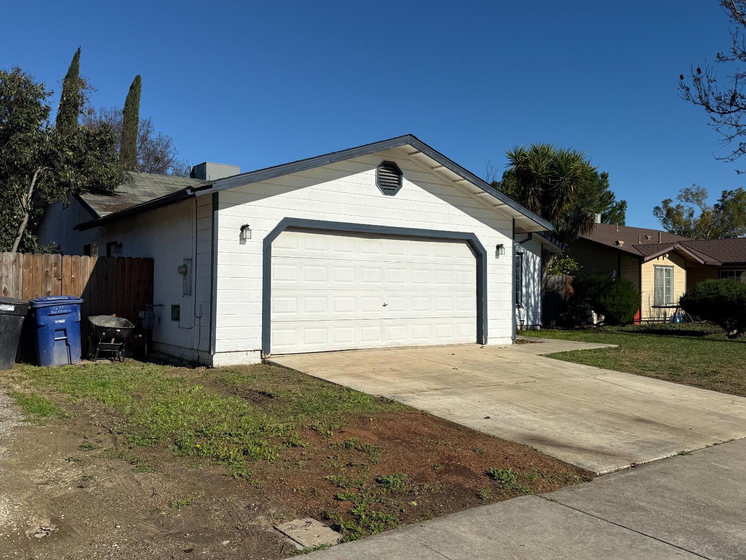 1625 Blue Spruce Way Newman, CA 95360 - Photo 3 of 22 view of front of home featuring driveway and an attached garage