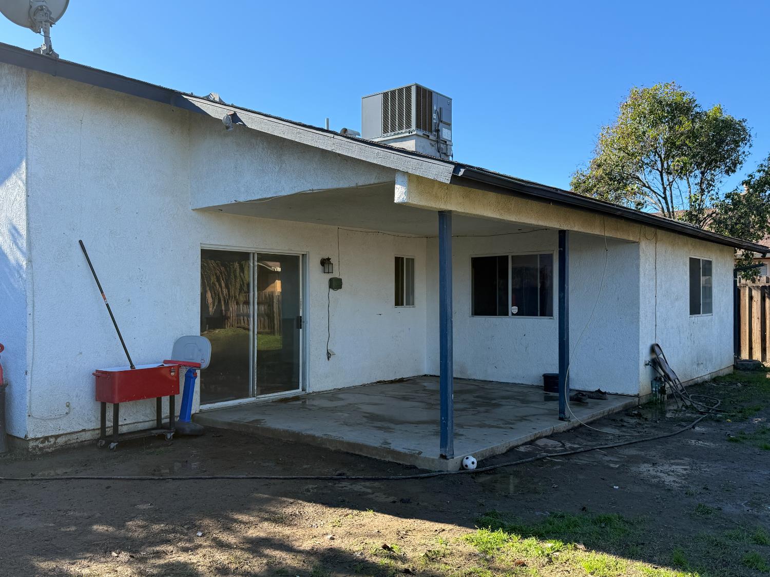 1625 Blue Spruce Way Newman, CA 95360 - Photo 6 of 22 rear view of property featuring a patio area and stucco siding