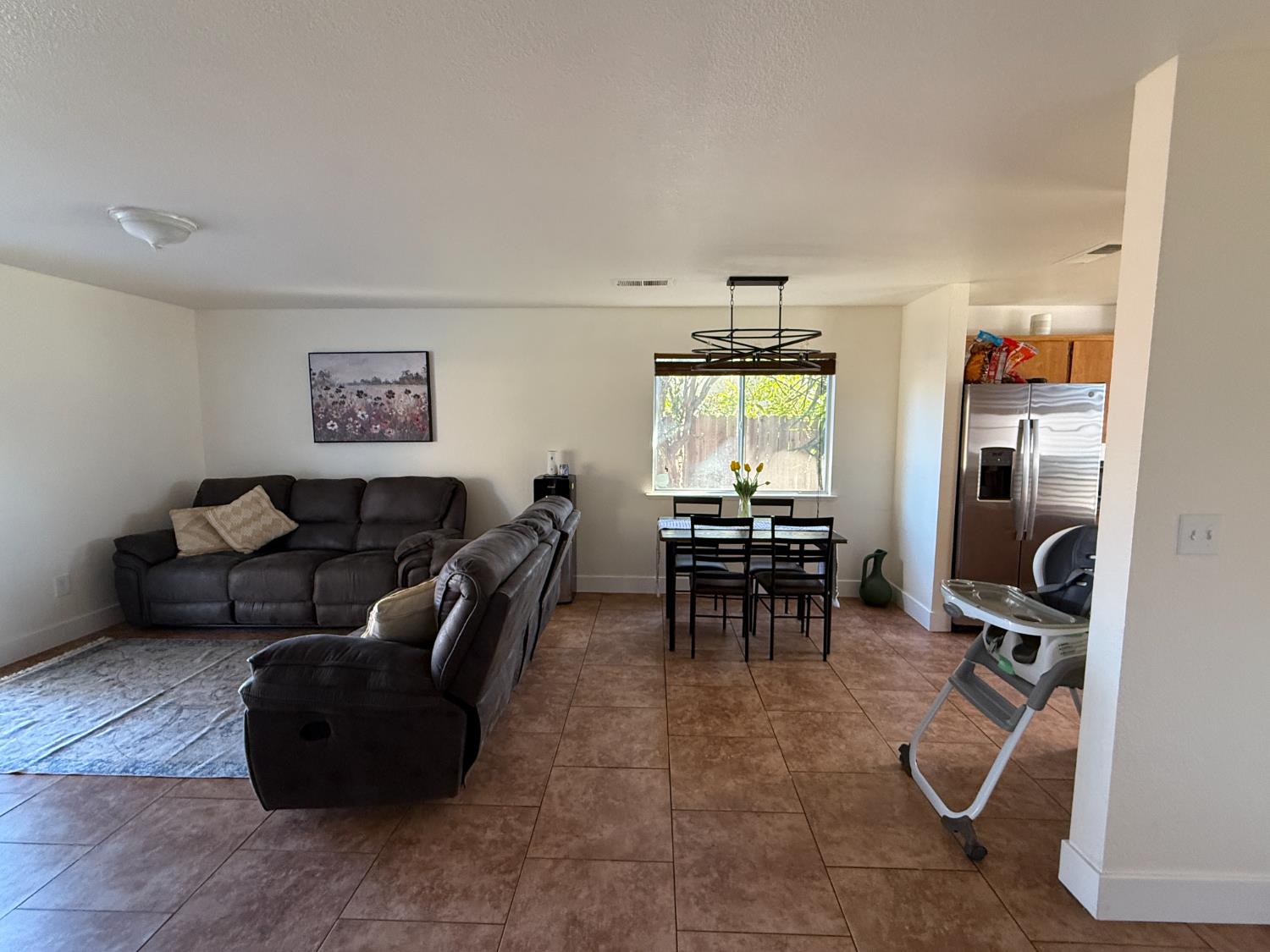 1625 Blue Spruce Way Newman, CA 95360 - Photo 9 of 22 tiled living area with baseboards