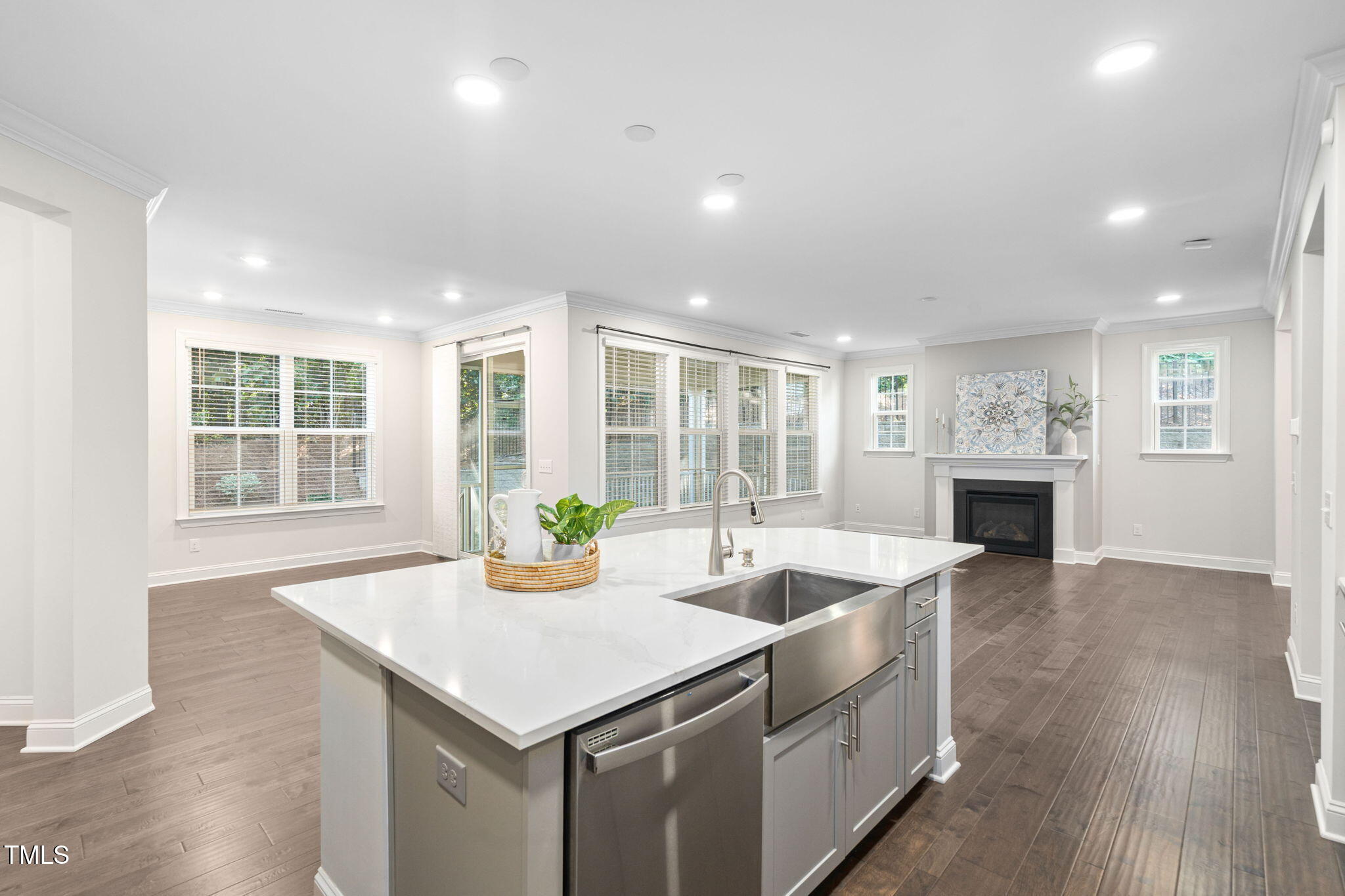705 Blue Pointe Path Apex, NC 27523 - Photo 10 of 39 a open kitchen with sink and cabinets