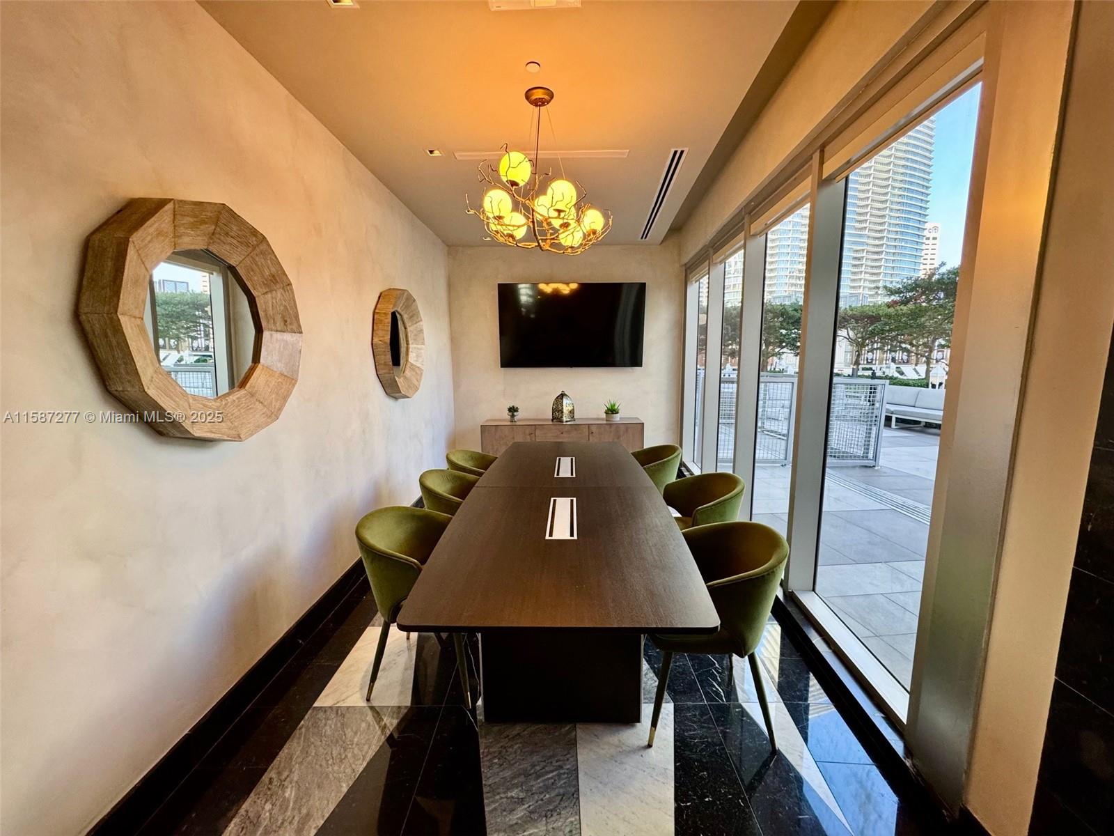 Brickell Miami, FL 33131 - Photo 14 of 15 a view of a dining room with furniture and a window