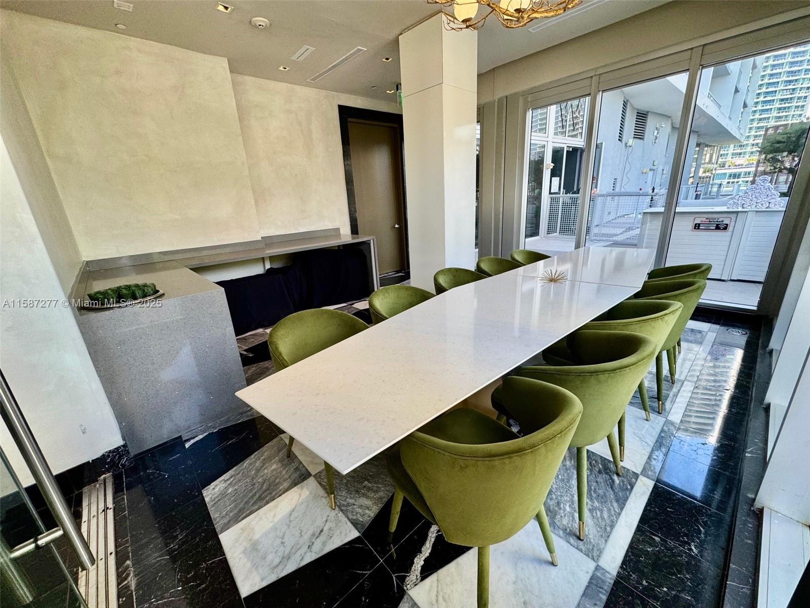 Brickell Miami, FL 33131 - Photo 15 of 15 a view of an outdoor dining space with furniture