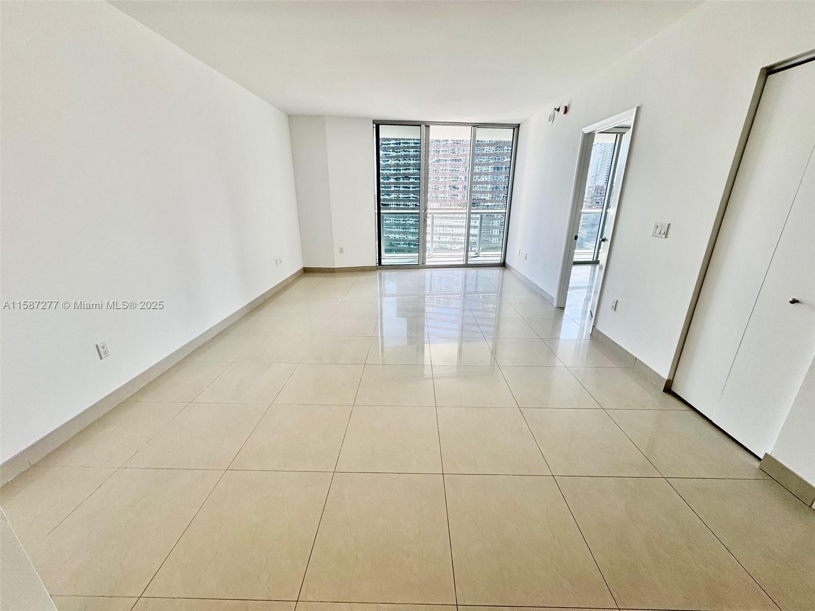 Brickell Miami, FL 33131 - Photo 4 of 15 a view of an empty room with a window