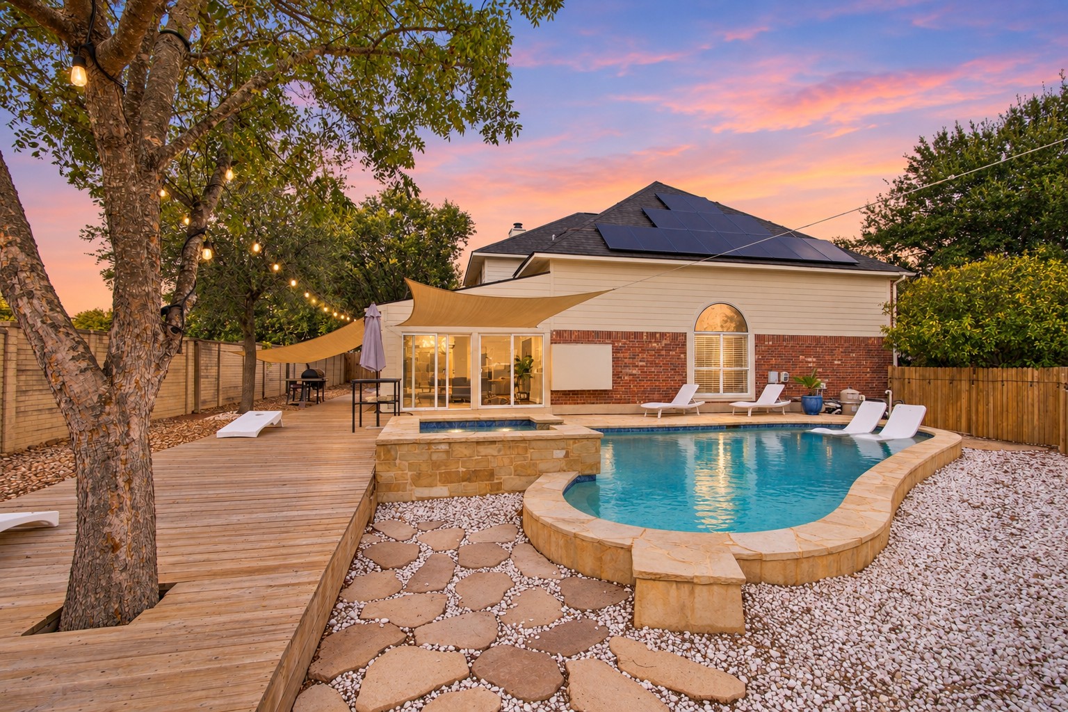 910 Point Run Drive Pflugerville, TX 78660 - Photo 1 of 39 A sparkling in-ground pool and spacious wooden deck anchor this private backyard oasis.