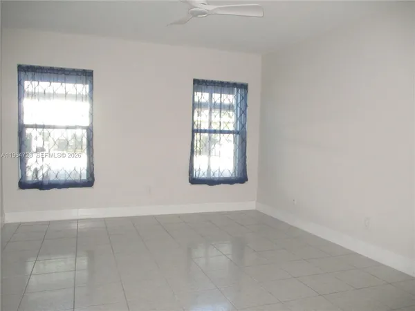 an empty room with windows