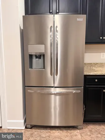 a close view of a refrigerator in kitchen