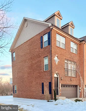 a front view of a house with stairs