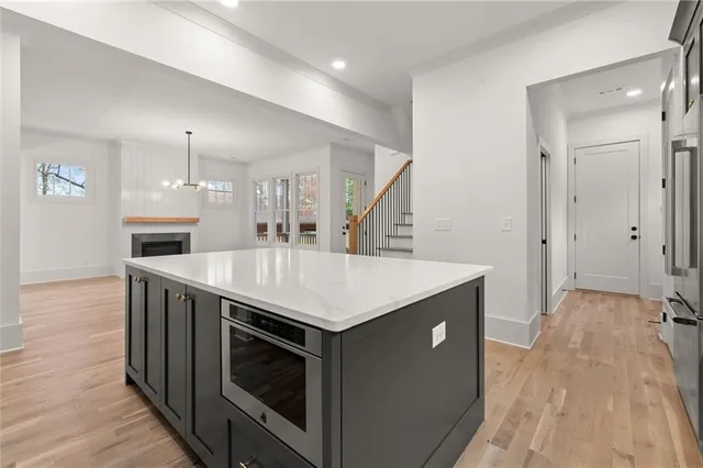 a kitchen with a stove and a sink