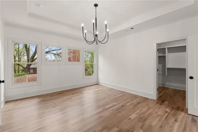 a view of an entryway with wooden floor