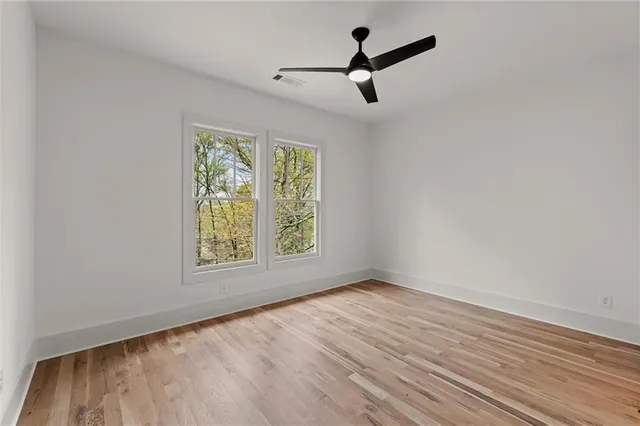 a bathroom with a sink and cabinets
