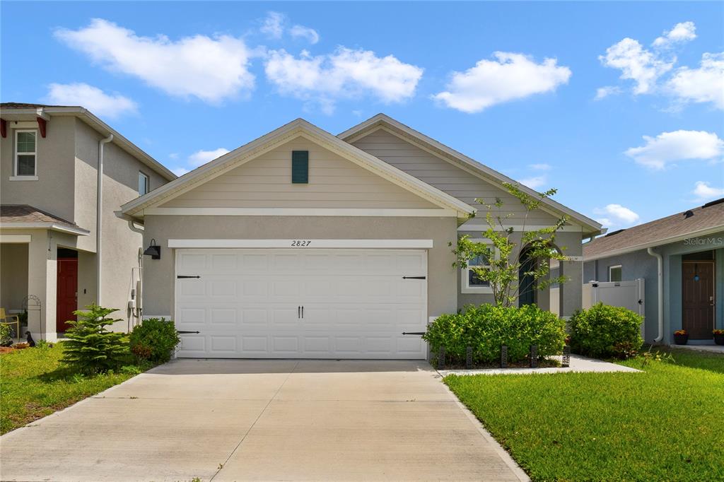 a front view of house with yard