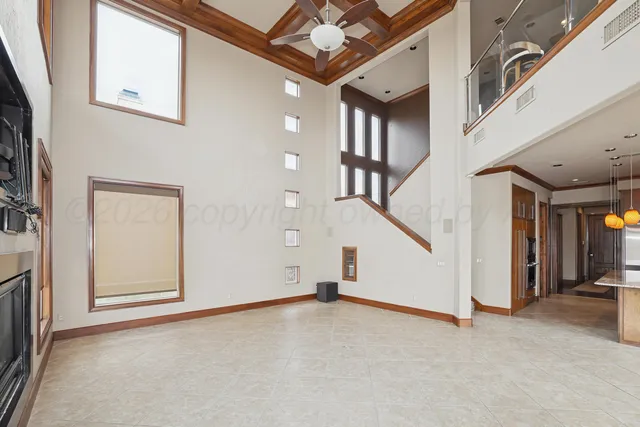 a bathroom with a shower and a glass door