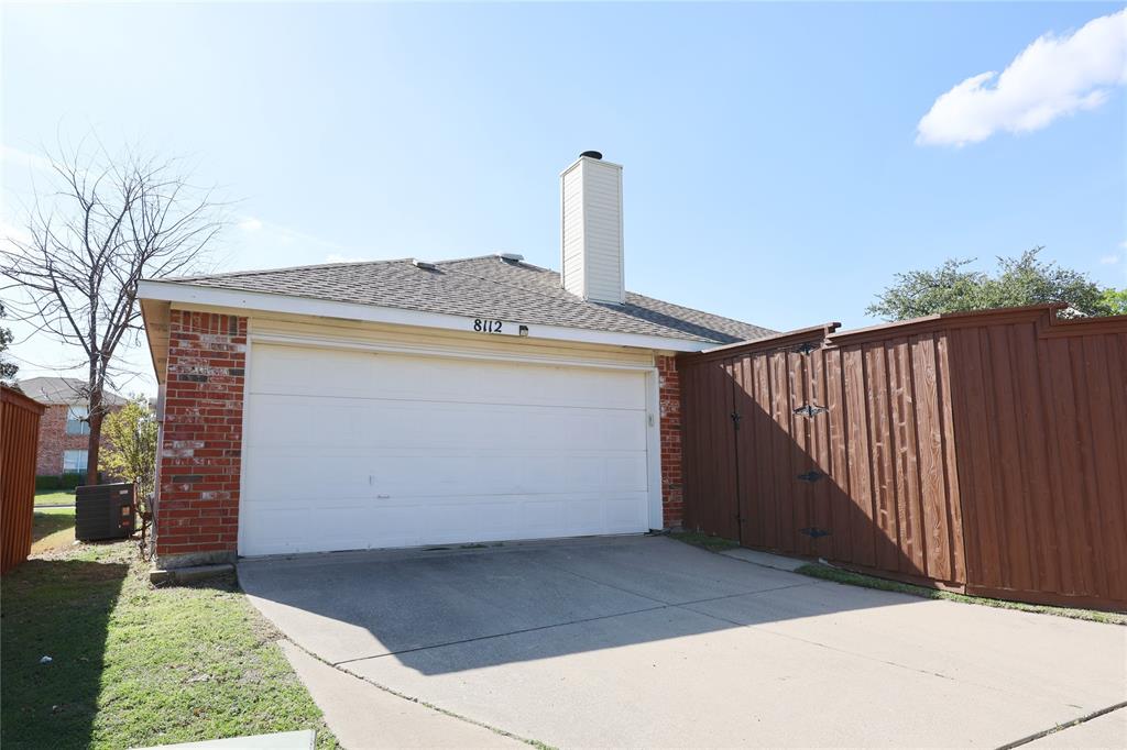 8112 Dock Street Frisco, TX 75035 - Photo 34 of 34 a view of a backyard of the house