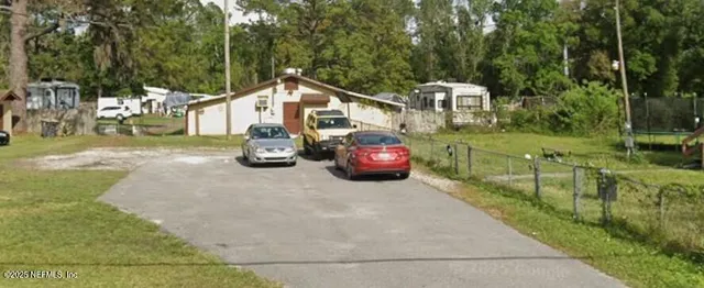 a car parked in front of a house
