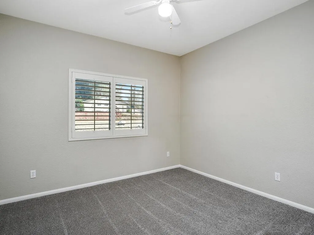 16304 Dartolo Road Ramona, CA 92065 - Photo 22 of 36 an empty room with a window