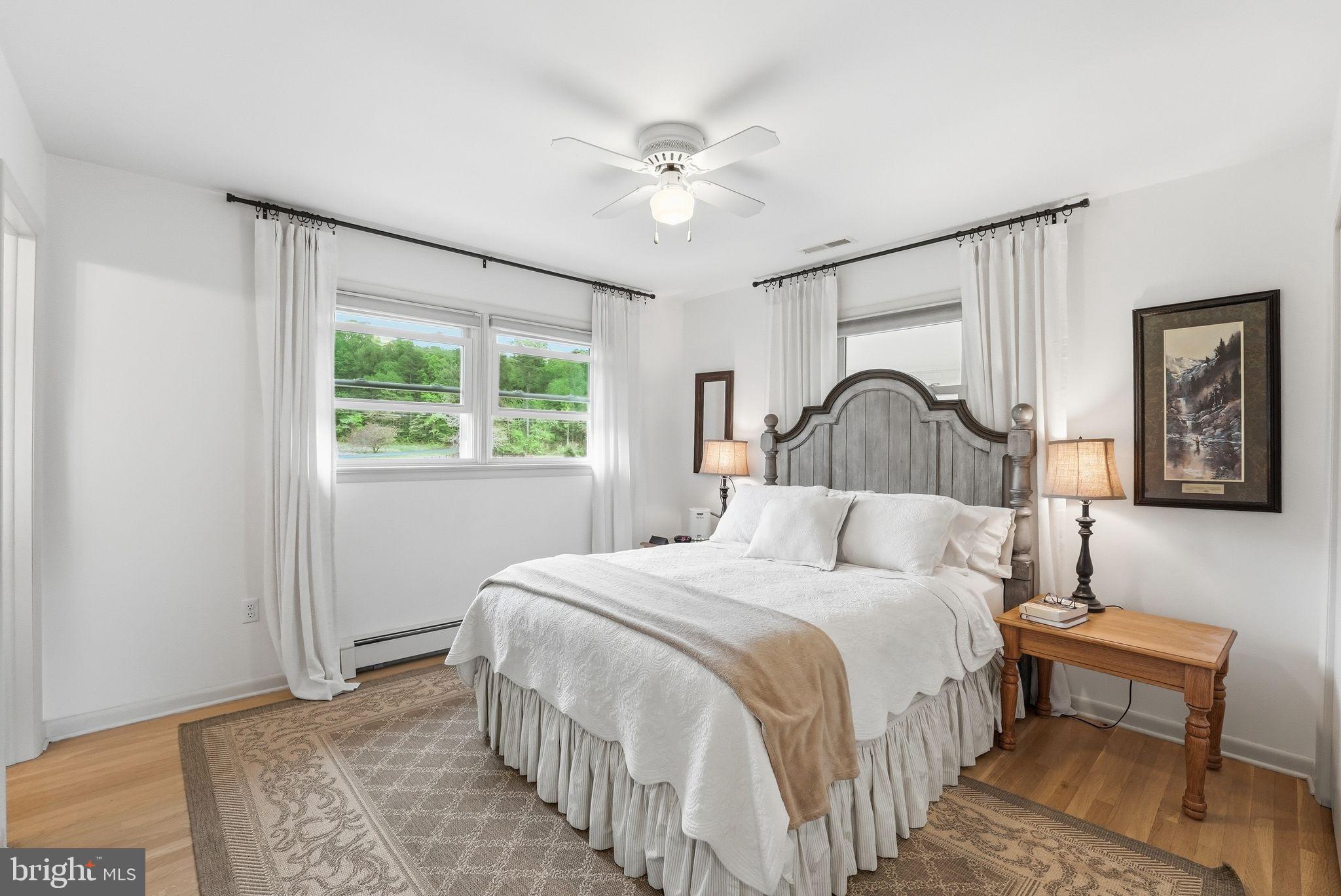 481 James City Road Leon, VA 22725 - Photo 25 of 88 a bedroom with a large bed and a window