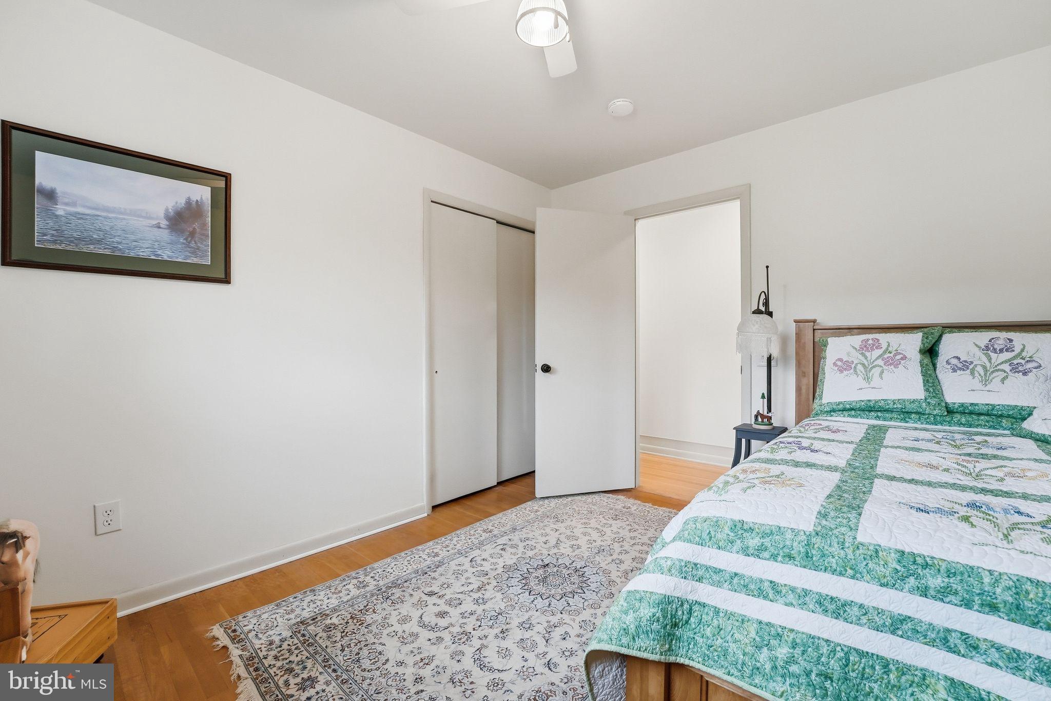 481 James City Road Leon, VA 22725 - Photo 32 of 88 a bedroom with a bed and painting on the wall